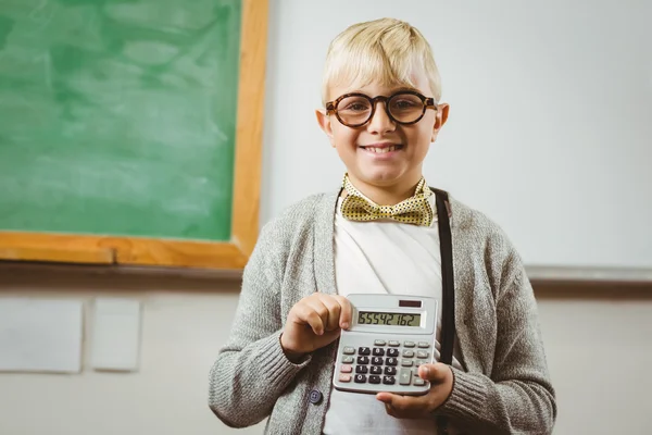 Pupil dressed up as teacher showing calculator