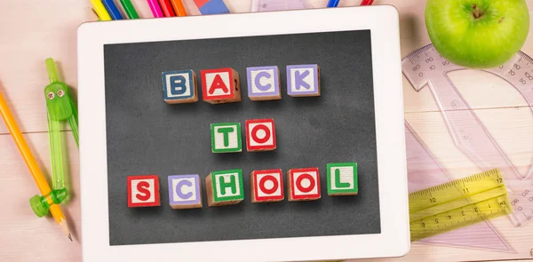 Back to school message with tablet pc