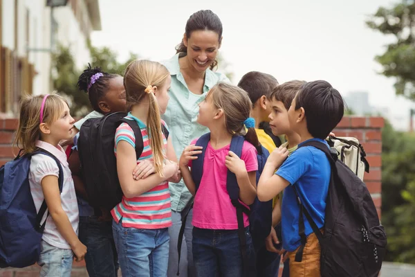 Cute pupils with their teacher