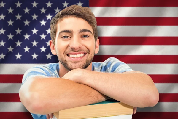 Students studying against american flag