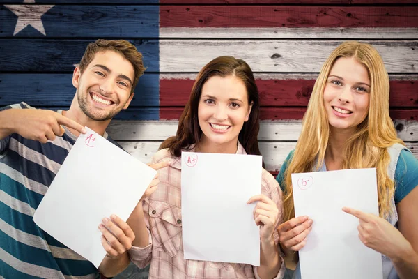 Students showing their exams