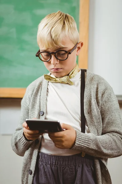 Pupil dressed up as teacher using calculator