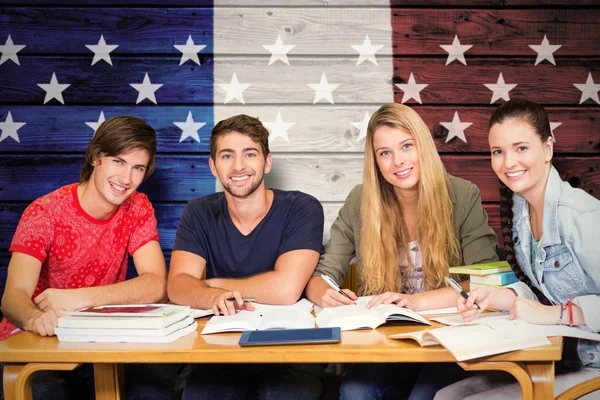 Students studying against usa national flag