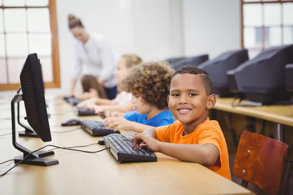 Students using computers in classroom