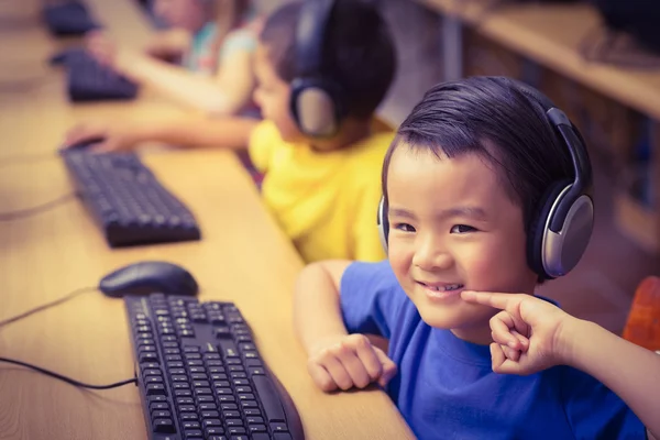 Cute pupils in computer class