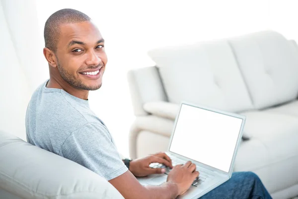 Happy man with laptop