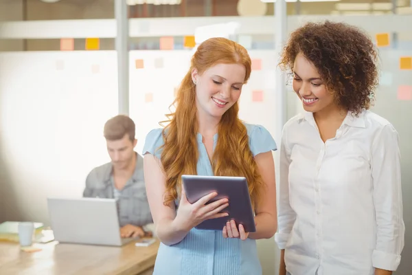 Businesswomen using digital PC