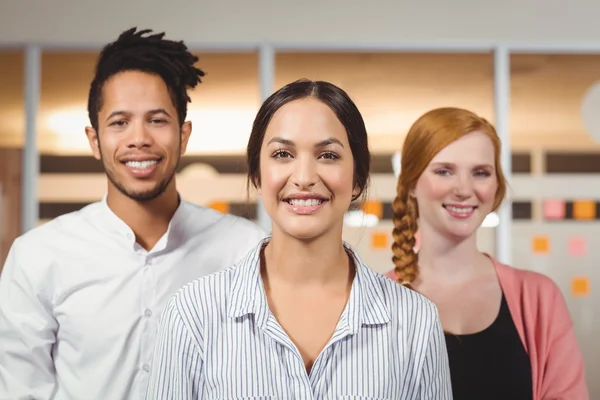 Portrait of confident smiling colleagues