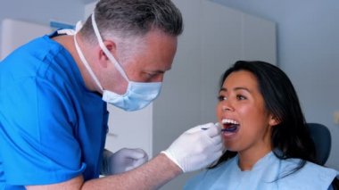 病人得到他们的牙齿检查 - 图库视频影像 Wave
