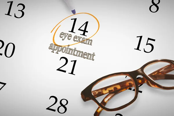 Eye exam appointment against reading glasses