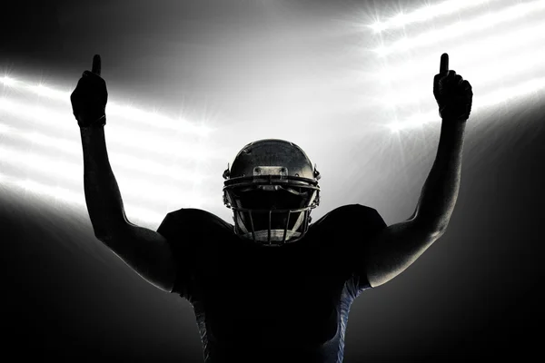 American football player with thumbs up