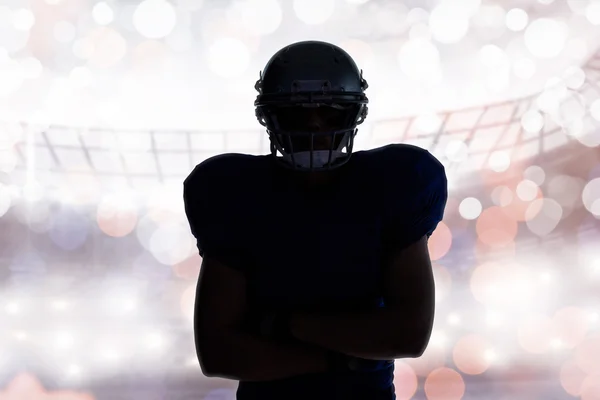 Silhouette of american football player standing