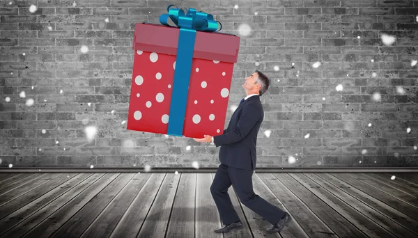 Stylish man with giant gift