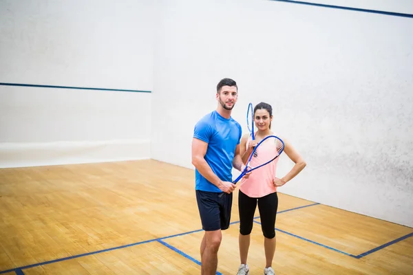 Happy couple after a squash game