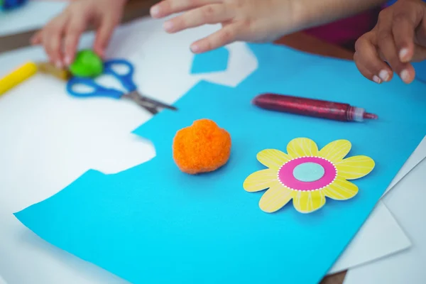 Girls making arts and crafts together