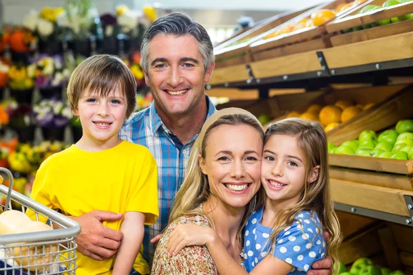 Smiling happy family posing together