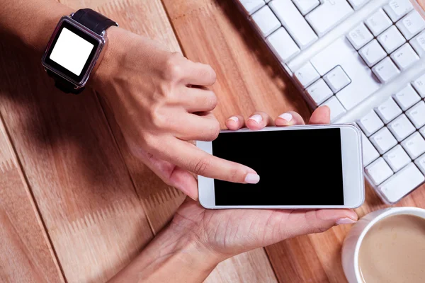 Feminine hands using smartphone