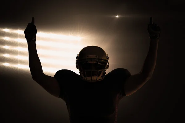 Silhouette American football player