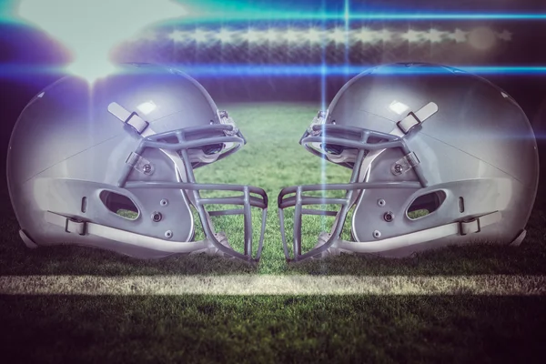 Composite image of american football helmets