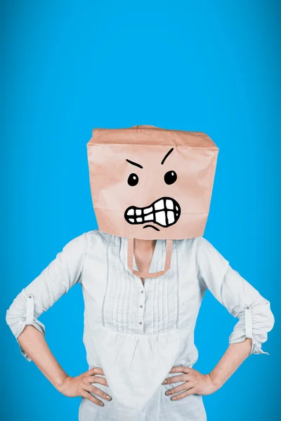 Woman covering head with paper bag