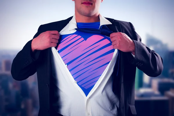 Businessman opening his shirt superhero style