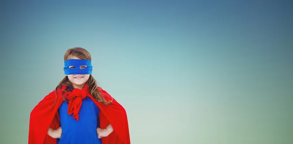 Masked girl pretending to be superhero