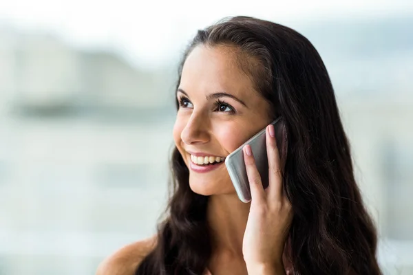 Smiling woman on phone call