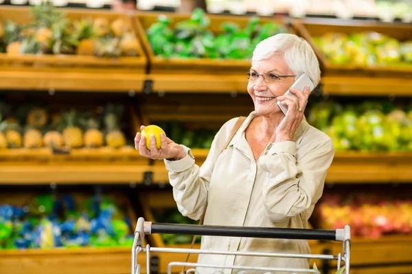 Old woman having a phone call