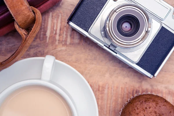 Camera with diaries and coffee