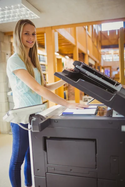 Blonde student making copy