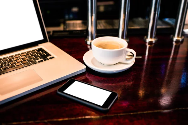 Coffee, smartphone and laptop