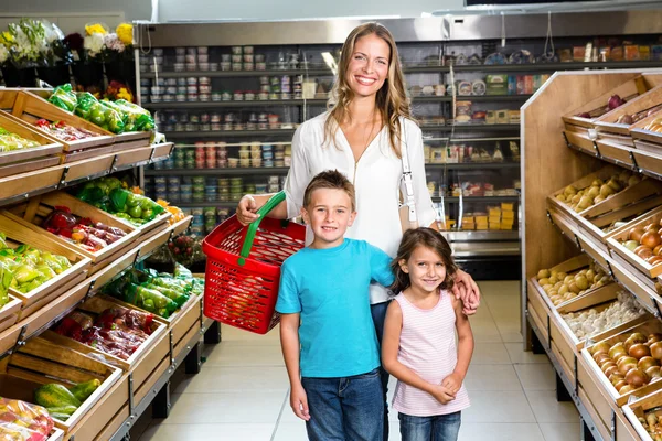 Smiling family in grocery store