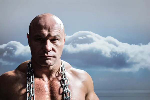 Muscular man with chain