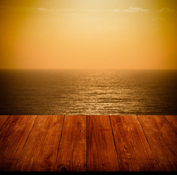Beautiful view of the Mediterranean Sea over old dark wooden tab