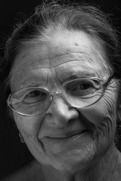 Portrait of elderly woman. Smile. Toned