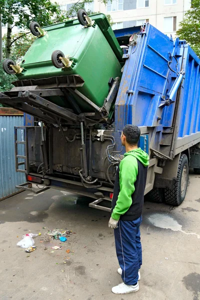 Loading of the garbage container, real photo.