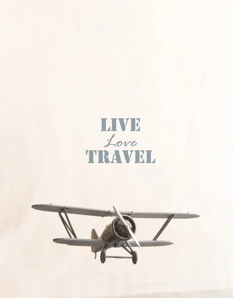 Live Love Travel idea, inscription and plane