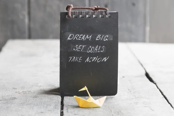 Dream Big - Set Goal - Take Action, handwriting on notebook cover