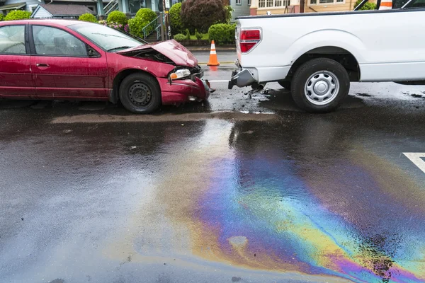 Iridescent oil spill caused by a traffic accident