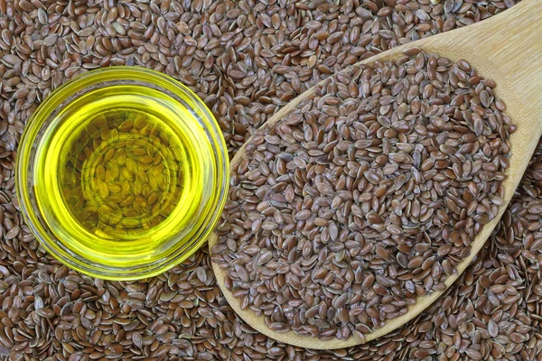 Cold pressed Linseed yellow oil on flaxseed