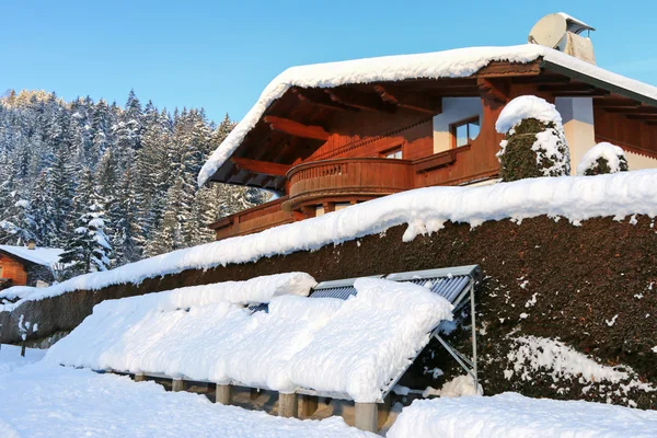 Evacuated tube solar thermal panels during the winter, Austria