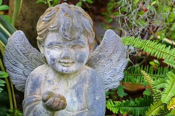 Angel Sculpture decorating the garden