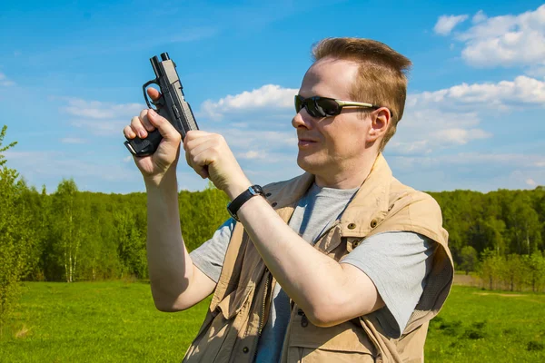 The man shooting from the sports gun