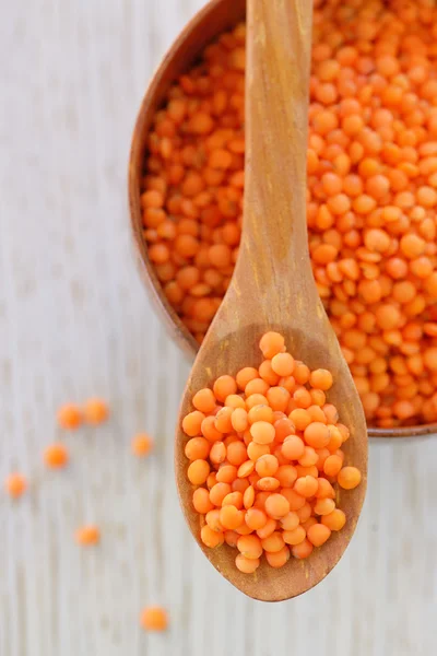 Red lentils in spoon