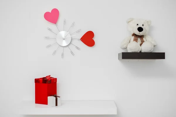 Clock with hearts on the wall