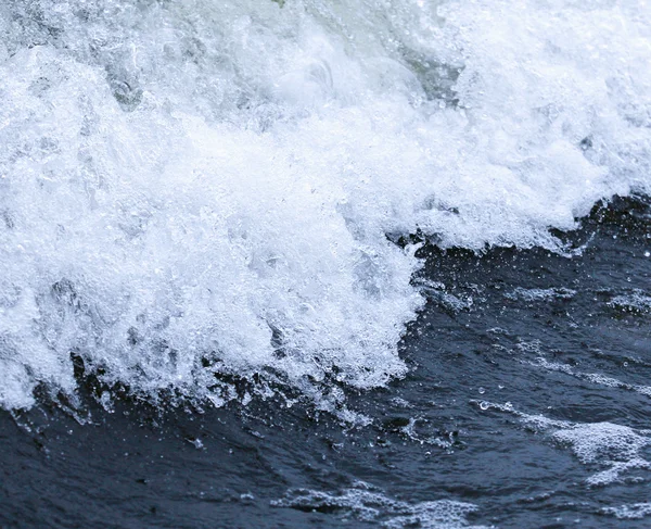 Big ocean wave breaking the shore