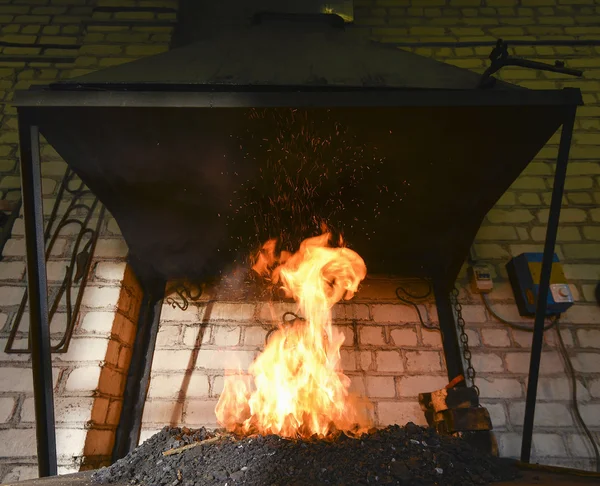 Forge fire in blacksmith\'s where iron tools are crafted