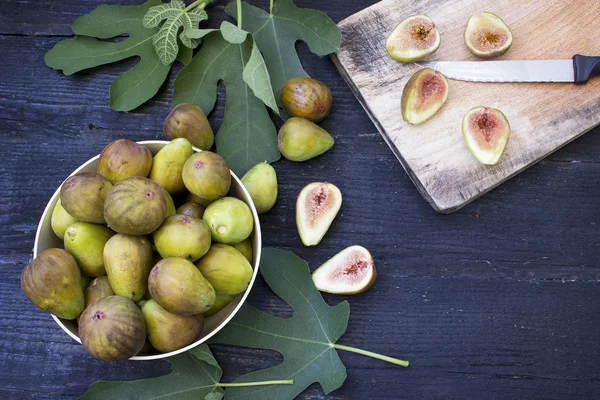 Fresh figs on dark background