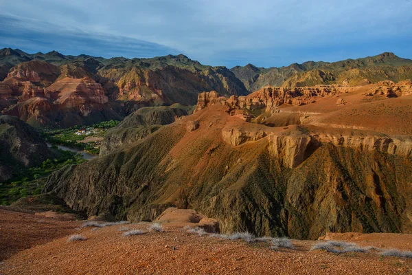 Red rocks and mysterious natural castles and figures in the valley of the river Charyn the Charyn canyon.