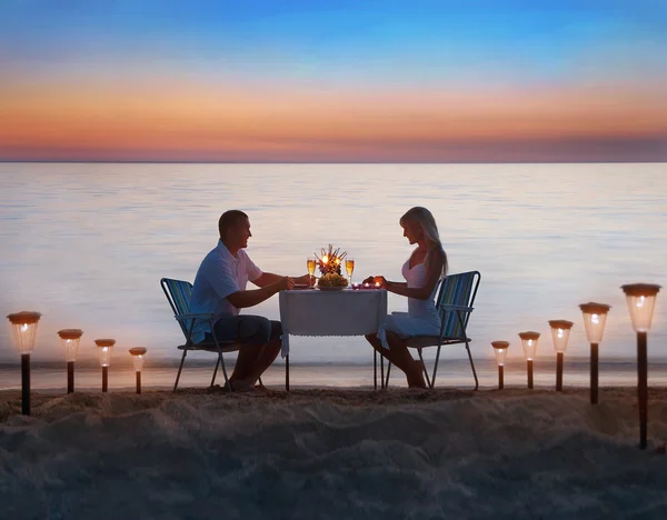 Loving couple share romantic dinner
